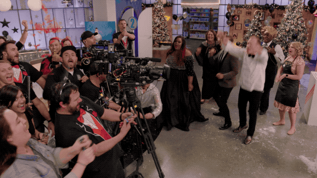 People are celebrating the New Year's Eve countdown to 2020 in a television studio