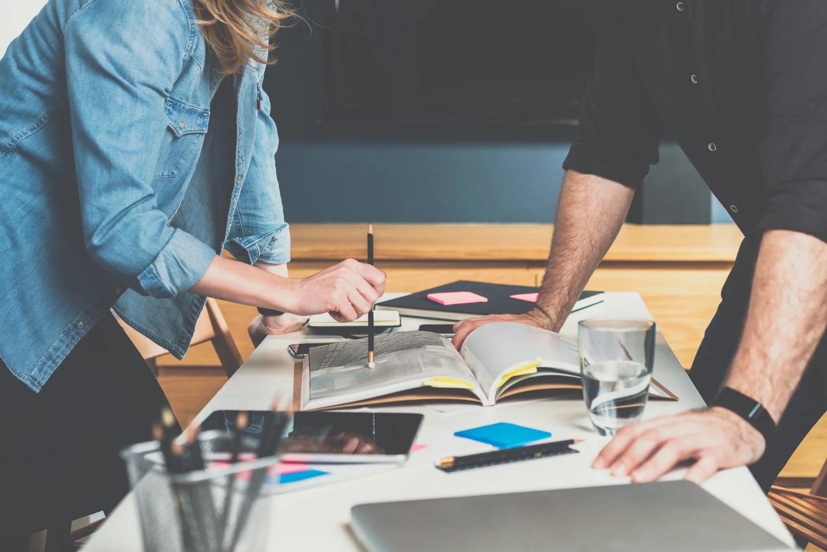 Two people are working on a digital strategy