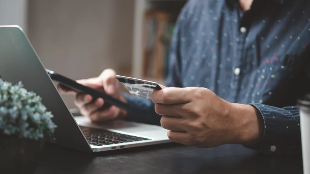 Online Shopping with a Credit Card on a Laptop