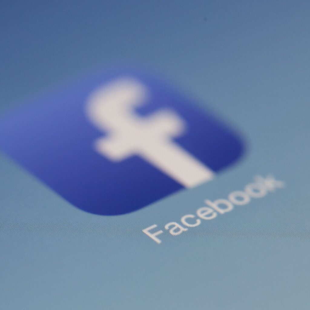 Close-up of the Facebook app icon on a screen.