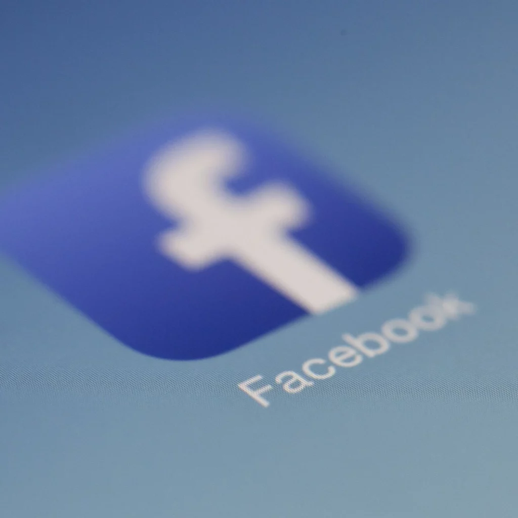 Close-up of the Facebook app icon on a screen.