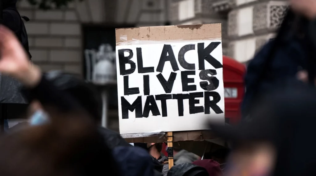 Demonstration with a "Black Lives Matter" sign