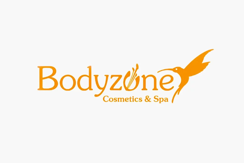 Bodyzone Cosmetics & Spa – orange Wortmarke mit Kolibri