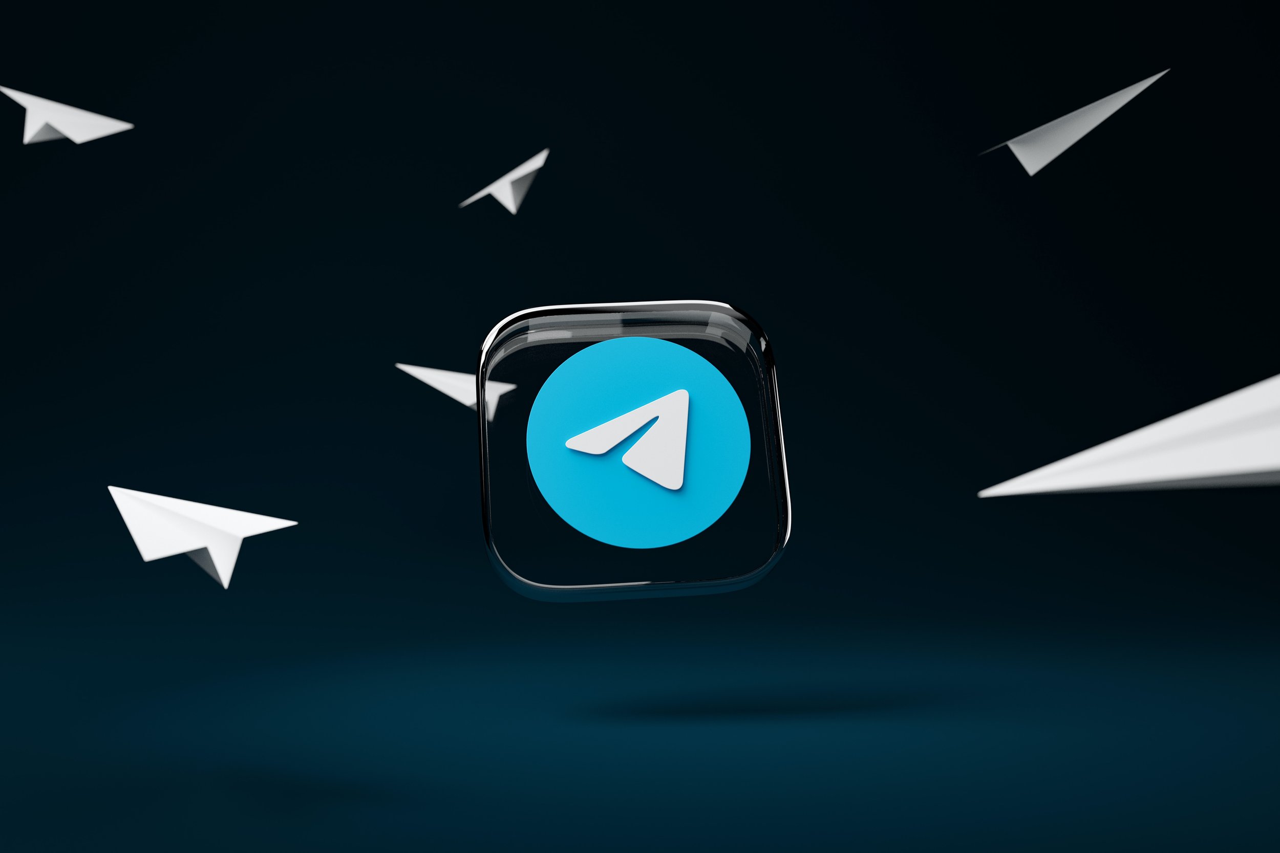 Telegram app icon surrounded by paper airplanes