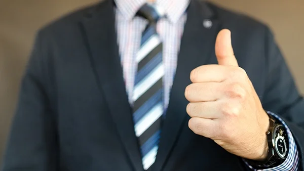 Businessman gives a thumbs-up
