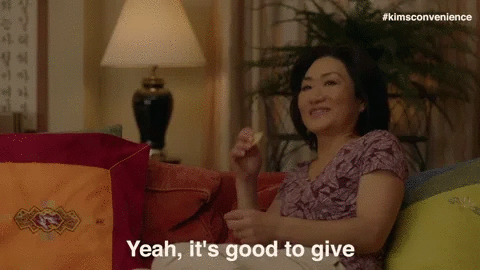 The woman says, "Yeah, it's good to give."