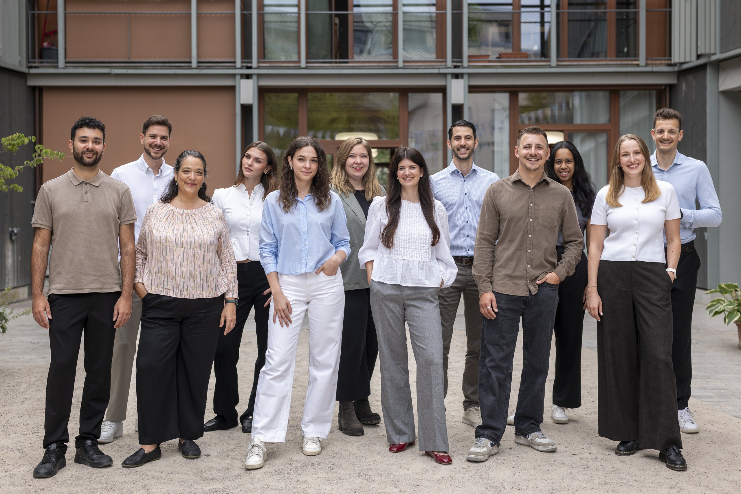 The onlineKarma team in front of the office building