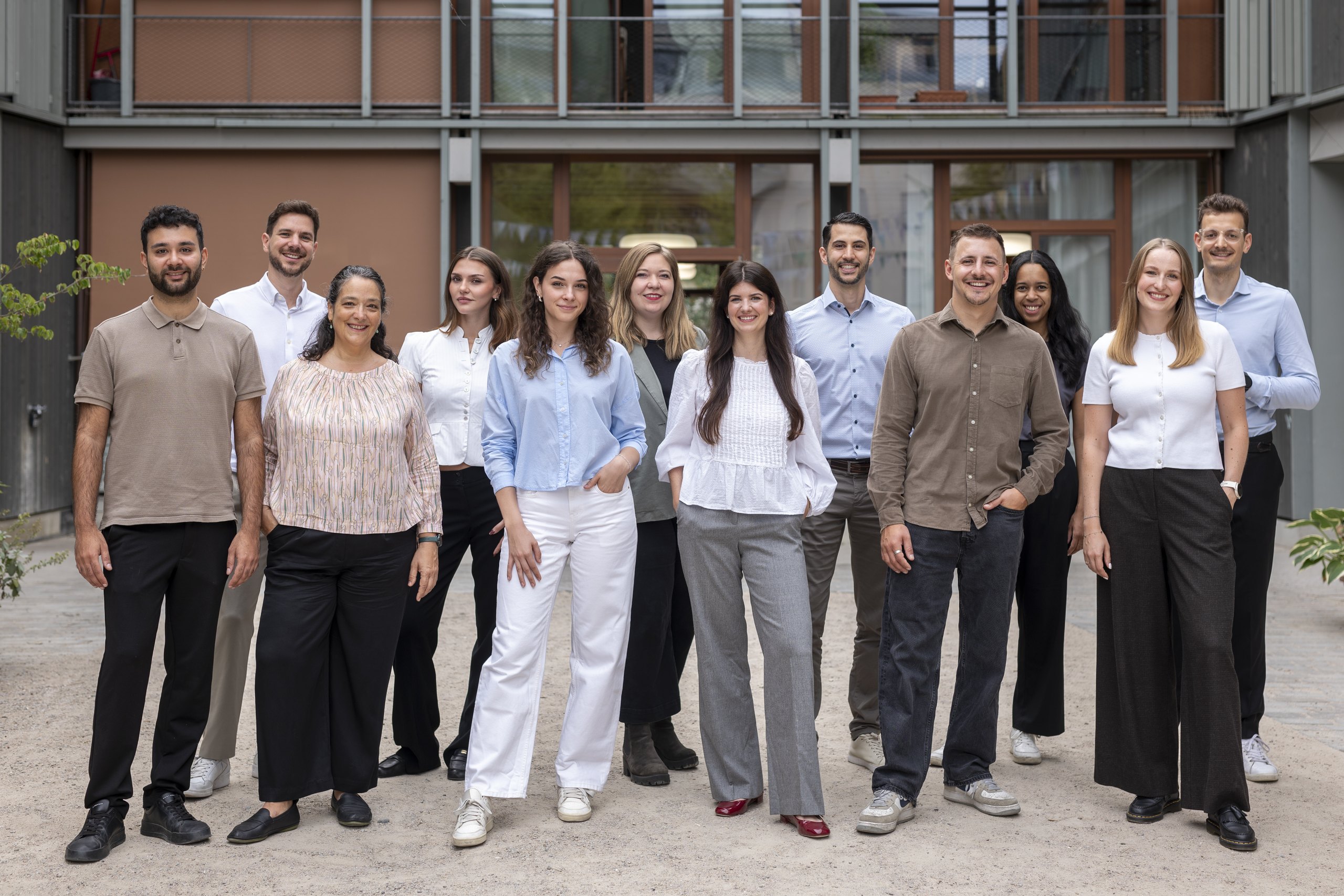 The onlineKarma team outside the office building